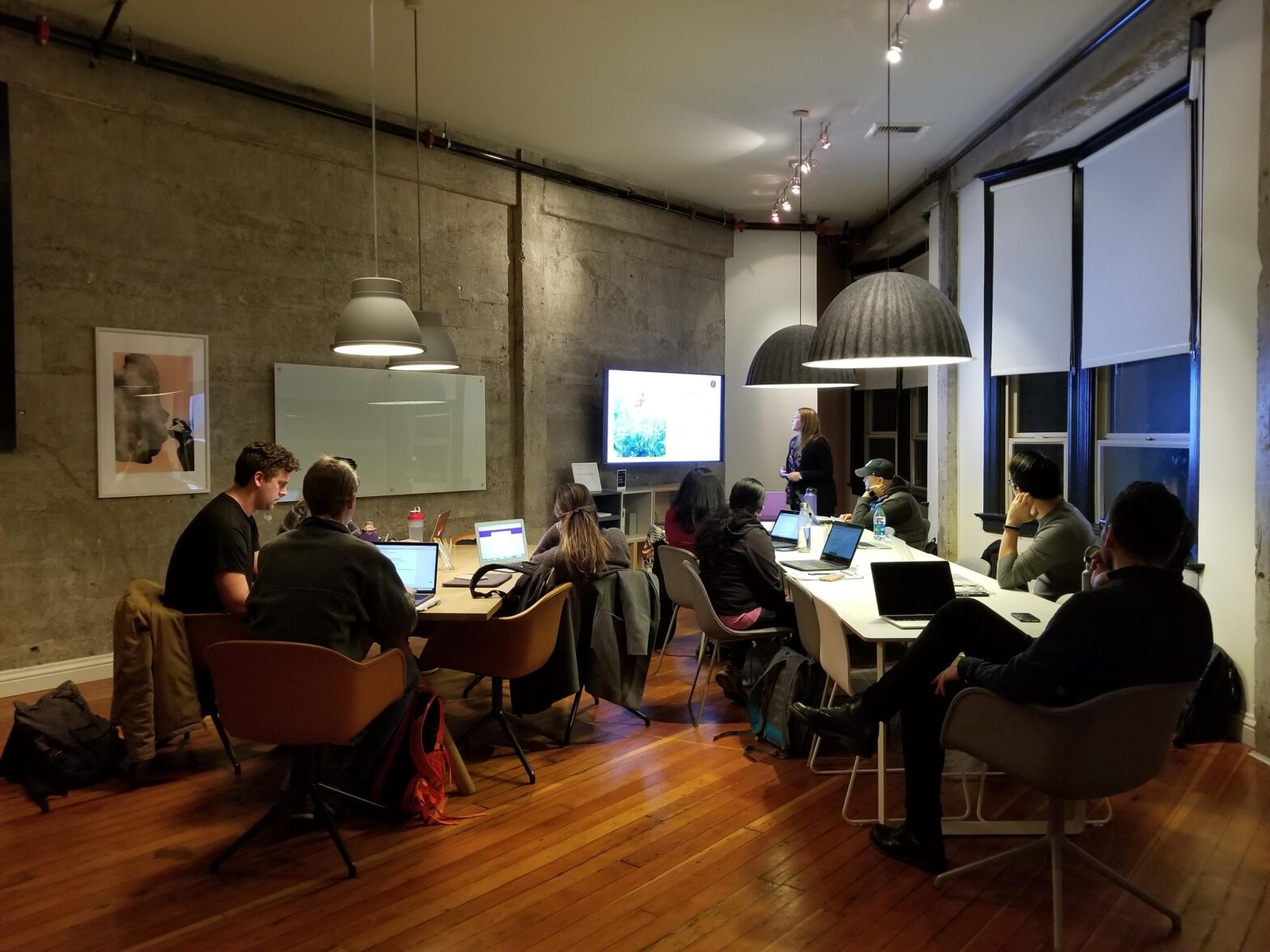 young professionals working collaboratively in a corner office